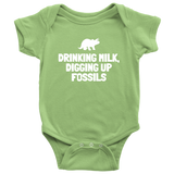Cute Paleontologist Baby One-piece - Dinosaur Baby Shirt - Fossil Hunter Baby - Drinking Milk Digging Up Fossils - Many Sizes And Colors