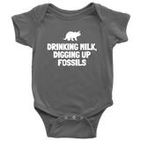 Cute Paleontologist Baby One-piece - Dinosaur Baby Shirt - Fossil Hunter Baby - Drinking Milk Digging Up Fossils - Many Sizes And Colors